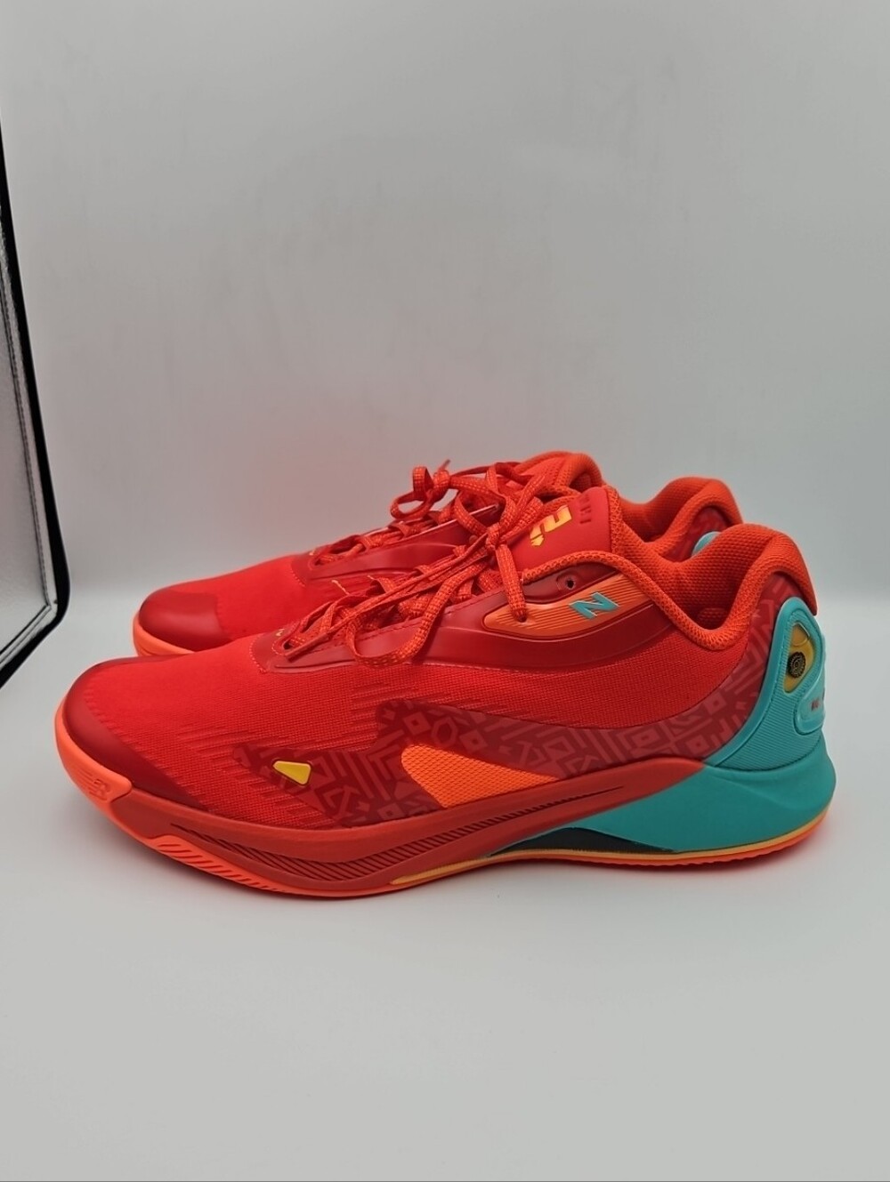 New Balance Red and Teal Athletic Shoes